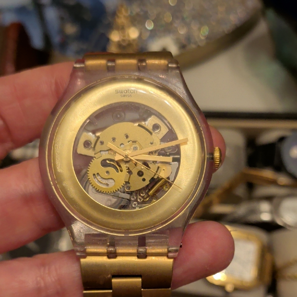 Swatch Gold and Clear Smartwatch
